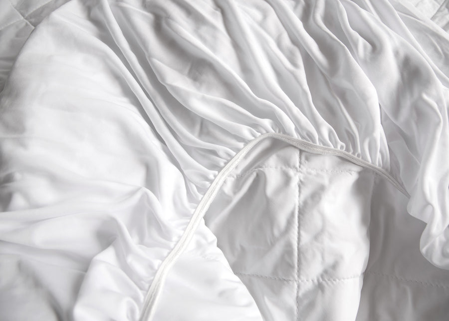 elasticized skirt premium white quilted silk mattress pad
