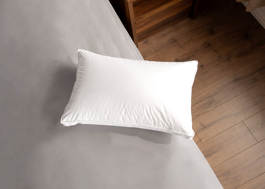 premium gusseted white duck down pillow aerial lifestyle