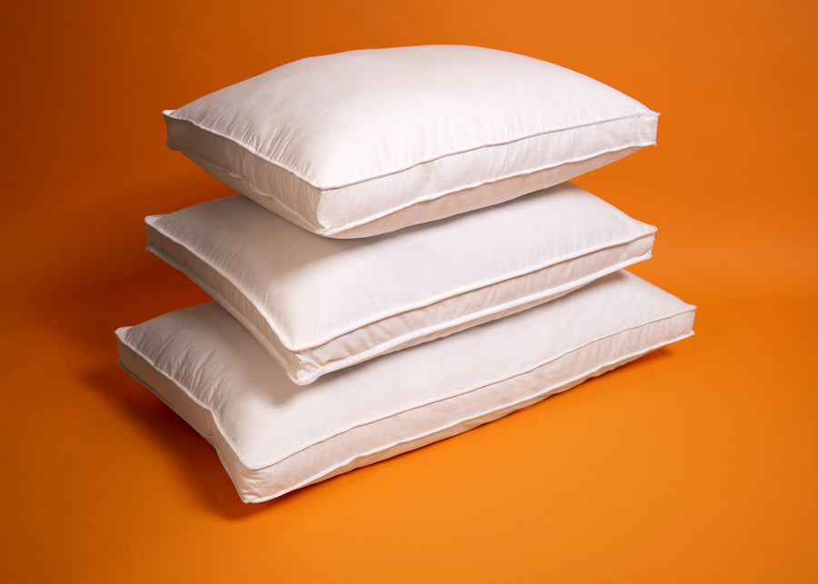 white down alternative polyester pillows stacked