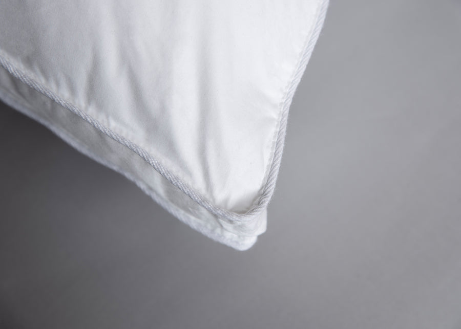 white gusseted  polyester pillow corner
