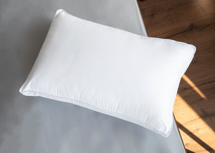 white antimicrobial pillow aerial lifestyle