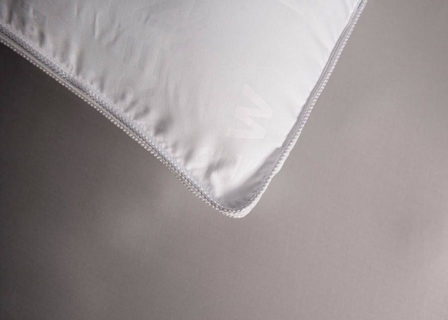 white recycled plastics polyester pillow corner close up
