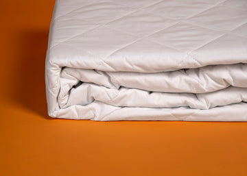 premium white quilted silk mattress pad