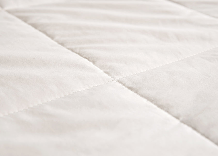 swatch texture of premium white silk duvet