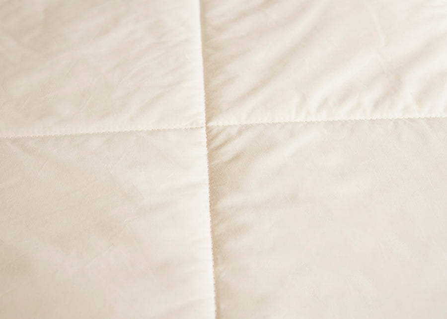 swatch texture of ivory wool duvet