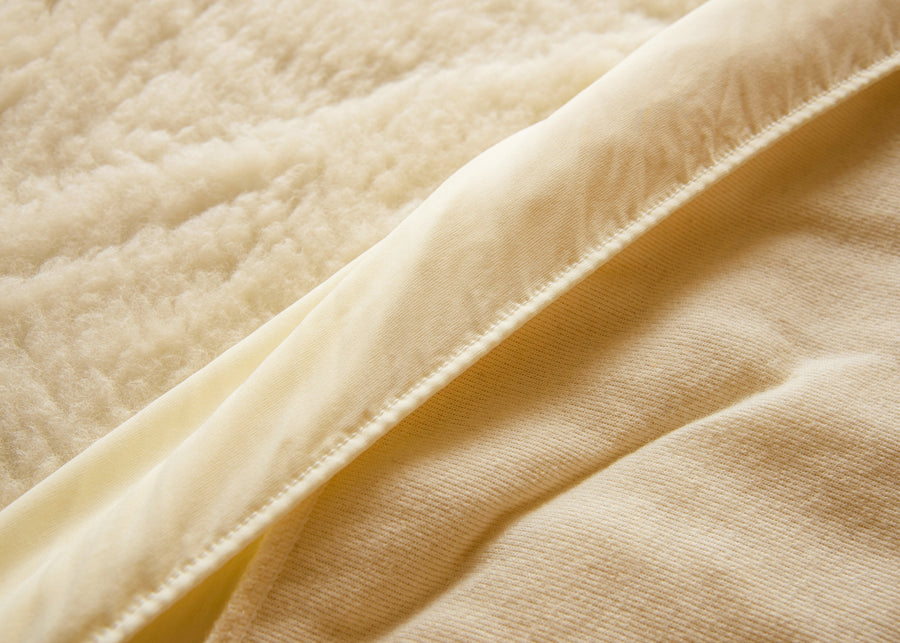 elasticized skirt ivory wool mattress pad