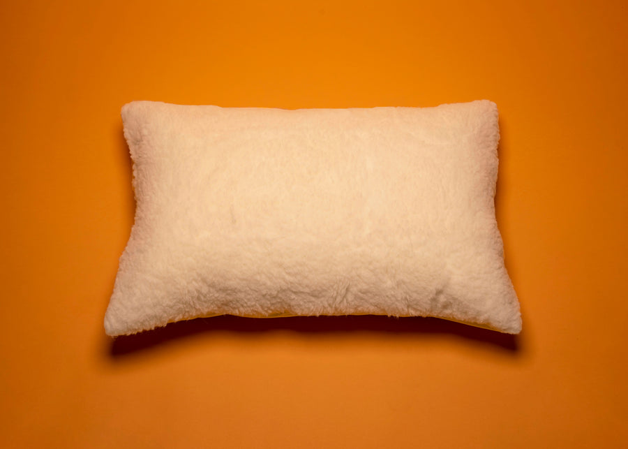 aerial view of ivory wool pillow protector
